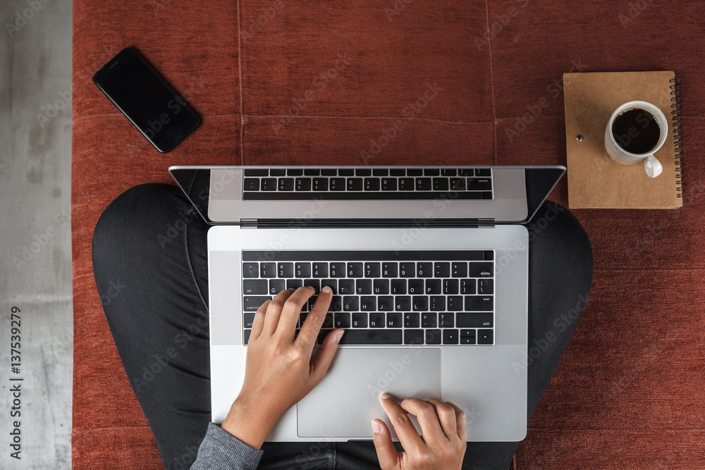 Poster person using new modern laptop computer on top view