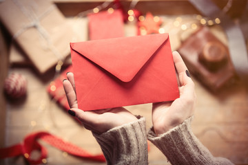 hands holding envelope