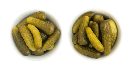 Homemade Pickled Gherkins or Cucumbers in Glass Round Bowl