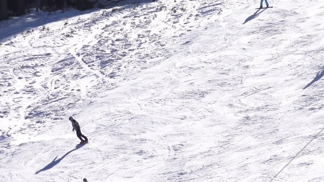 skier skiing swings on slope 