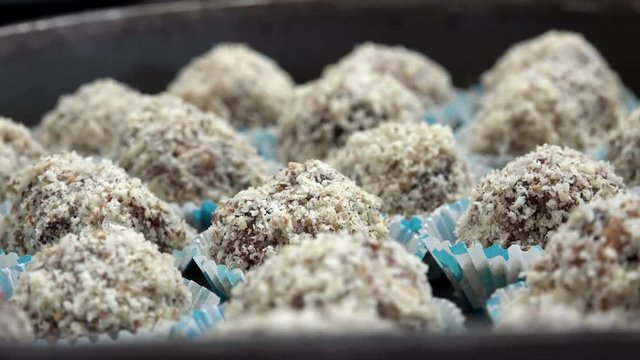 Chocolate coconut candy balls, closeup 