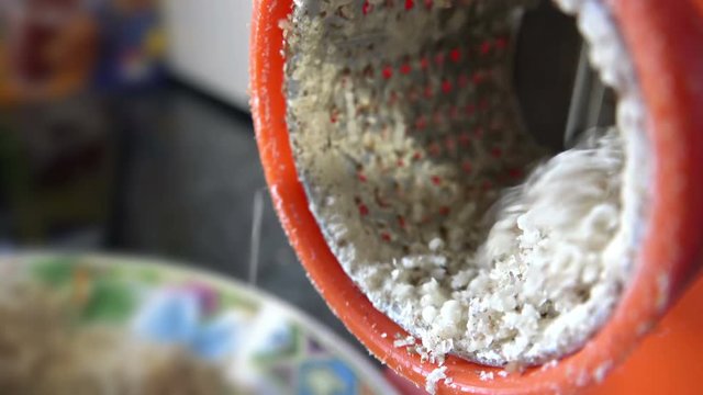 Nuts are minced hand grinder