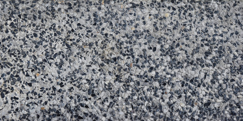 washed gravel stone of sand wall texture or sand wall background