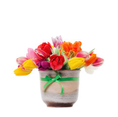 tulips in a vase on a white background