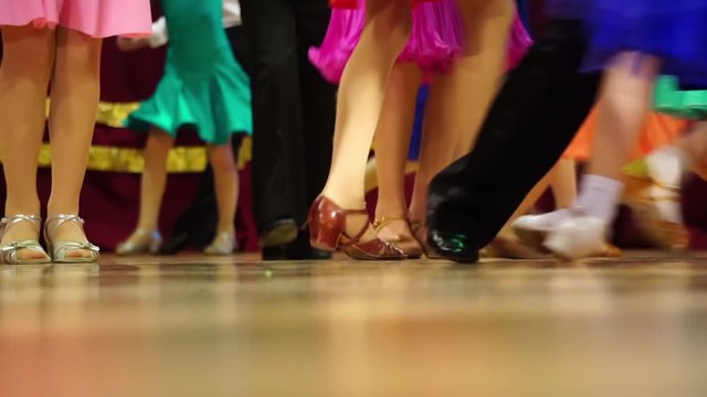 Background - children's tournament on ballroom dances - feet on the floor