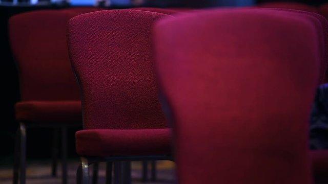 Stage lights tests and conference chairs before event