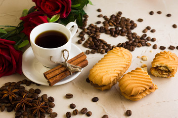 Biscuit sandwich with caramelized milk on a marble table. Tasty dessert.