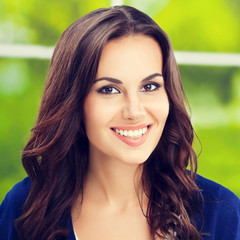 happy smiling young brunette woman