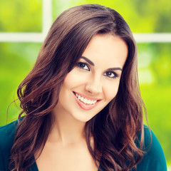 happy smiling young brunette woman