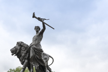 Progress, one of four bronze statues around the Victoria memorial monument in London