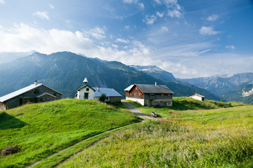 Fototapeta na wymiar Small Settlement In The Alps
