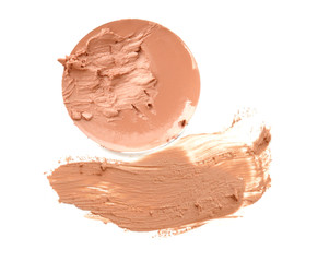 Beige make up foundation close up isolate on white.