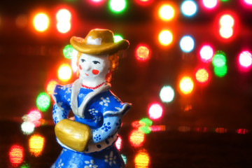 Clay figurine of woman in vintage dress