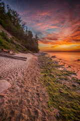 Beautiful long exposure landscape of rocky sea shore. Tranquil scene of Baltic sea.