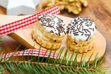 Christmas sweets on a wooden spoon
