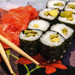 Sushi set on black background