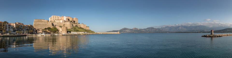 Fototapeta premium Panoramic view of Citadel and harbour entrance at Calvi Corsica