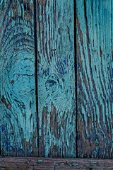 background of old textured wooden boards with shabby blue color paint. vintage rustic fence wall backdrop. template for design. Copy space