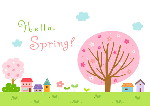 Spring landscape with cherry blossom trees and village.