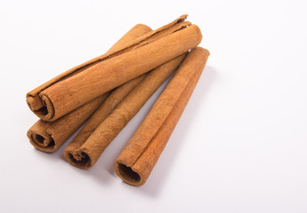 Cinnamon sticks isolated on white background.