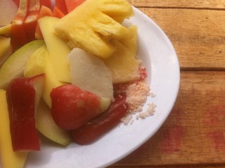 Rujak, Indonesia Salad Fruit at Wooden Board
