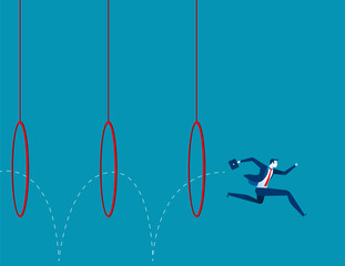 Business man jumping through hoops © zenzen