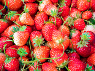 Closeup group of fresh strawberries texture background.