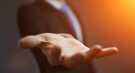 Businessman showing his empty hand
