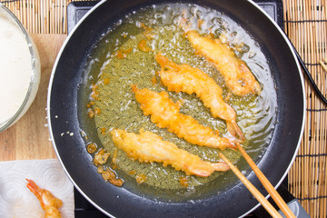 Chef frying shrimp Tempura