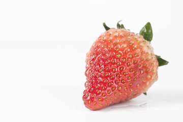 Closeup of delicious strawberry on a white background