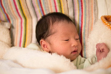 sleeping Japanese newborn baby