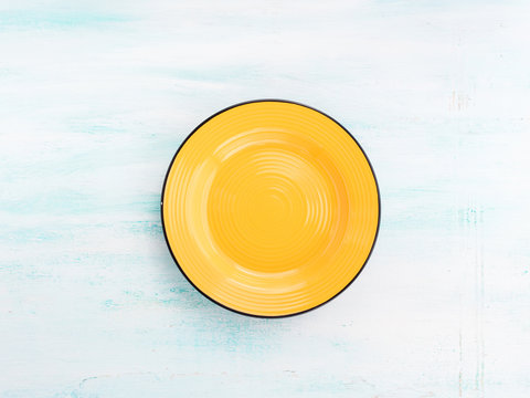 Pastel Color Yellow Ceramic Plate Dish Top View Background