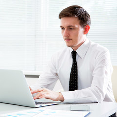 Businessman working with laptop