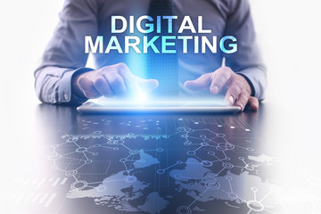 Fototapeta na wymiar Businessman is using tablet pc and selecting digital marketing.
