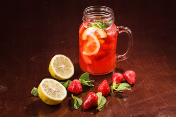 Coctail in a glass with raw fruit