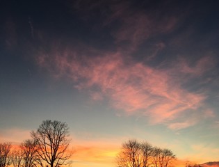 Obraz premium dramatic sky at sunset in winter