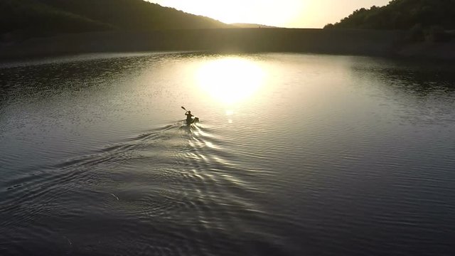 Padlling towards the morning sun