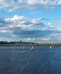 The barge floating in the blue Dnieper waters