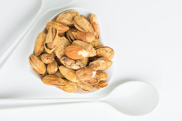 Almond nuts to stay healthy for the body. almond on white background