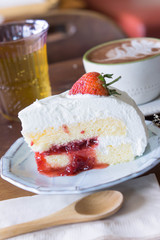 coffee cup and strawberry cake in coffee shop ,coffee relax time