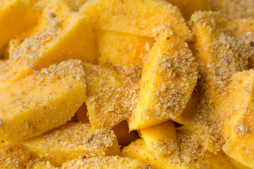 Yellow mango with white ground flax seeds. Very usfull raw food