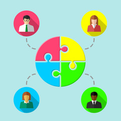 Teamwork concept with puzzle and diverse group of business people