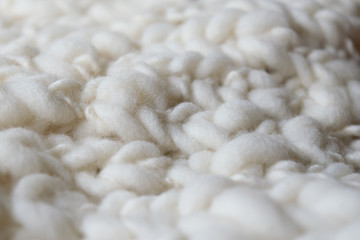 White knitted woolen fabric