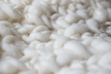 White knitted woolen fabric