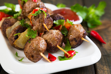 Kebab with meat balls and vegetables