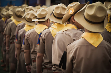Backside of asian boy scout group line up and prepare for boy scout camp activities. - obrazy, fototapety, plakaty