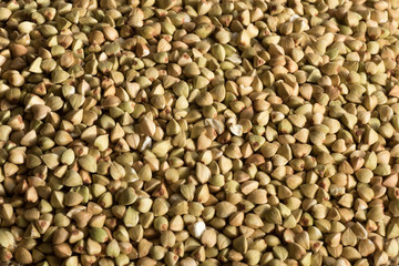 Buckwheat grains background.