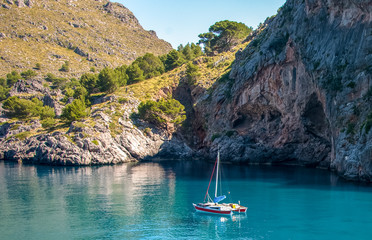 Boat in the Mediterranean Sea bay, Mallorca Spain © Maks_Ershov