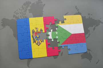 puzzle with the national flag of moldova and comoros on a world map