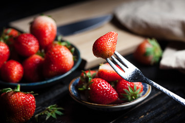 eating fresh strawberry